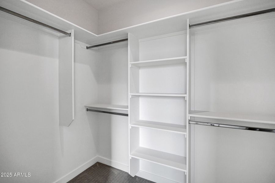 Walk-In Closet in Primary Bedroom