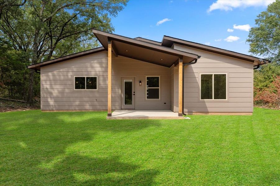 Front exterior of a new home in , Gun Barrel City, TX, highlighting curb appeal (Image 24). Front exterior of a new home in , Gun Barrel City, TX, highlighting curb appeal (Image 24).