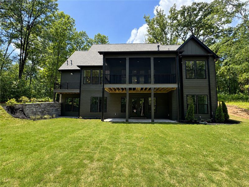 A spacious green lawn provides a verdant backdrop A spacious green lawn provides a verdant backdrop