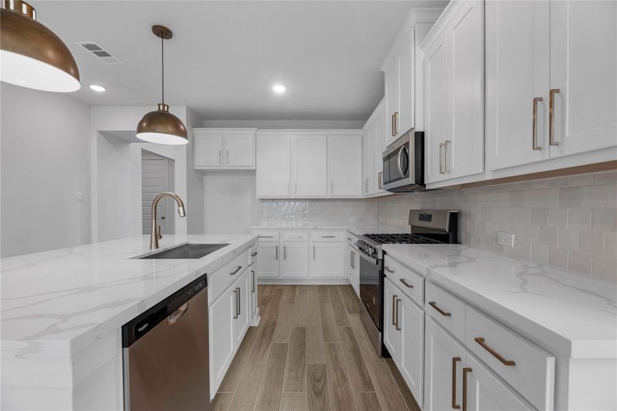 Furnished interior view inside a new home in Sienna, Missouri City (Image 7).