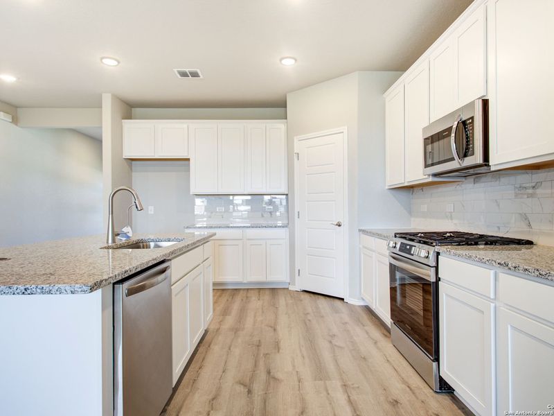 Furnished interior view inside a new home in Comanche Ridge, San Antonio (Image 8).