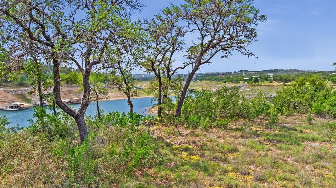 Framed by mature live oaks and native landscape, the site offers a feeling of peacef
