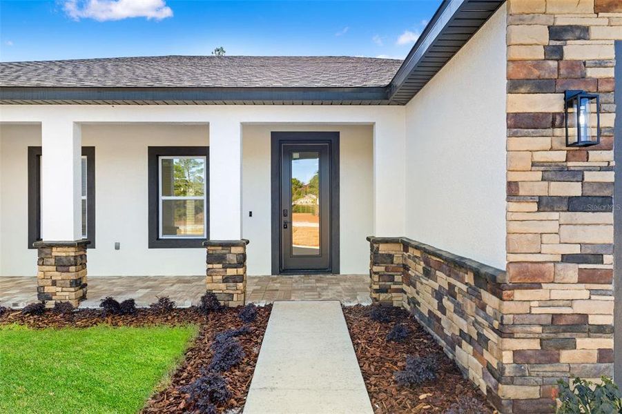 Exterior details and patio area of a home in , Brooksville (Image 29).