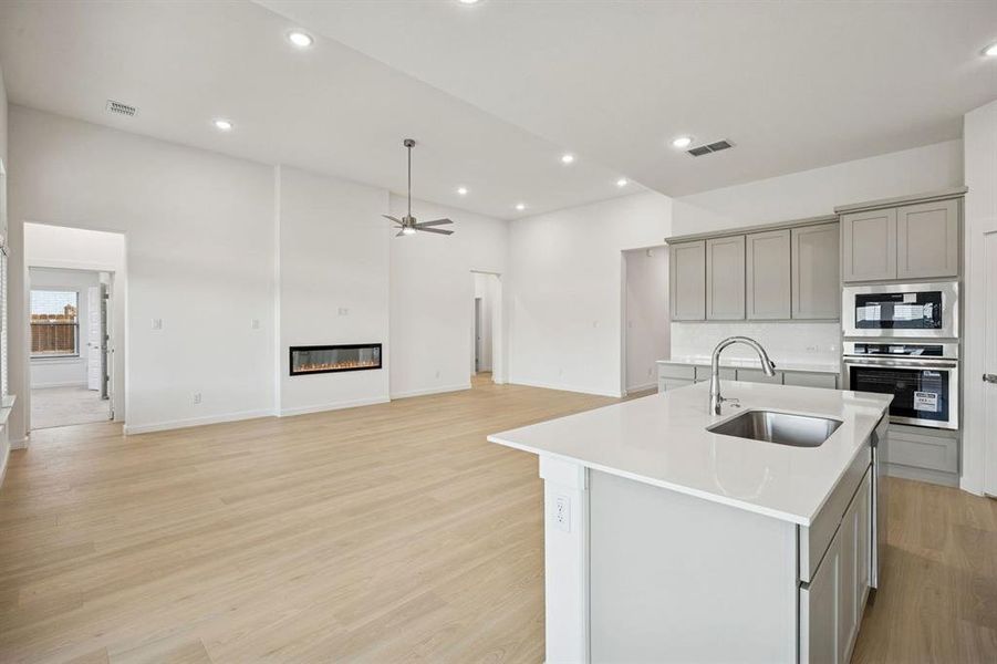 Open Floor Plan in the Gilmour II home plan by Trophy Signature Homes – REPRESENTATIVE PHOTO Open Floor Plan in the Gilmour II home plan by Trophy Signature Homes – REPRESENTATIVE PHOTO