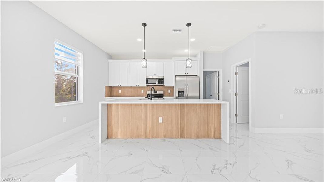 Furnished interior view inside a new home in , Lehigh Acres (Image 7).
