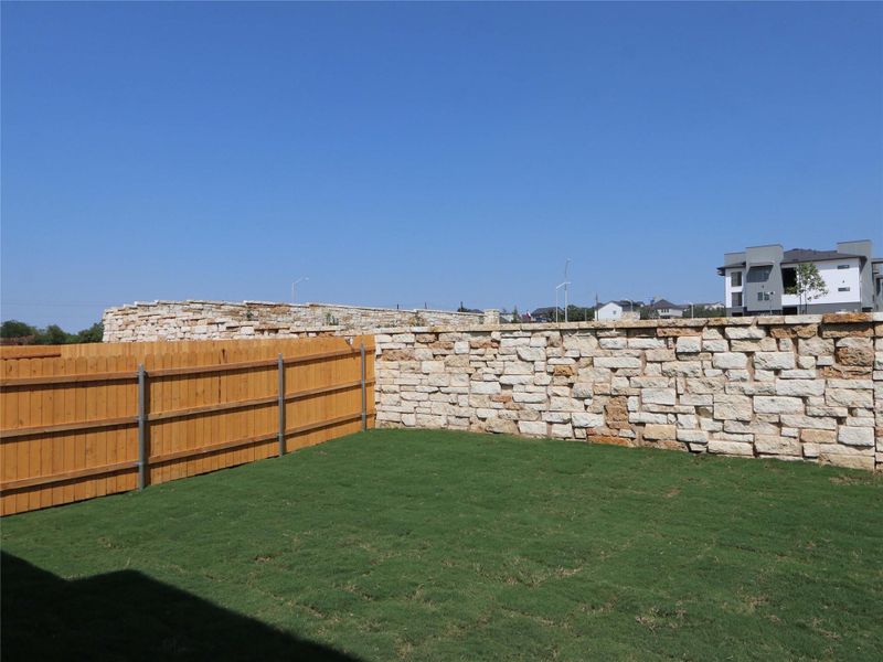 Exterior details and patio area of a home in Estancia West, Manchaca (Image 22).
