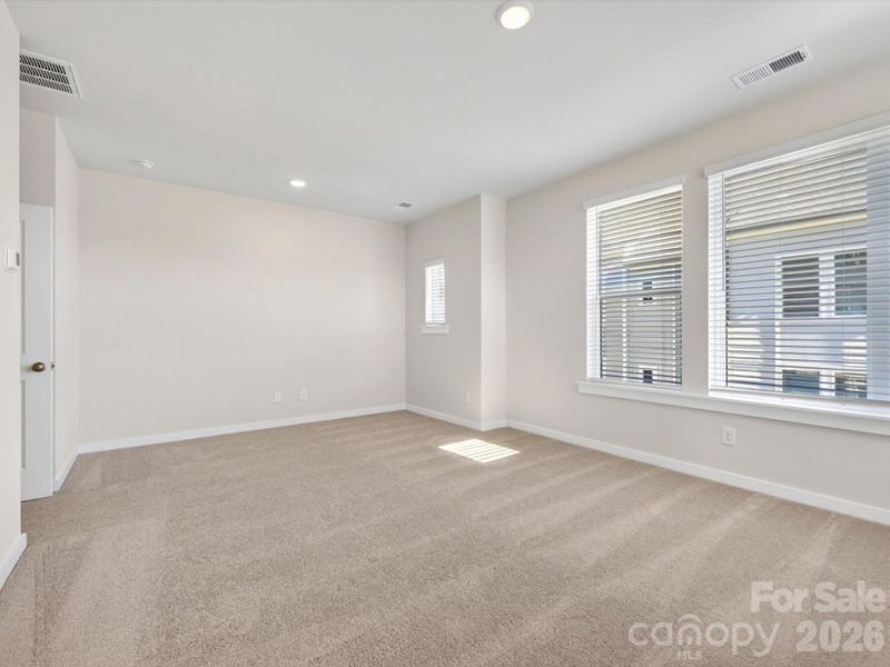 Spacious, unfurnished interior of a new home in Central Living at Craig, Charlotte (Image 24).