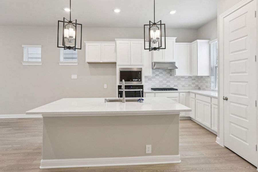 Furnished interior view inside a new home in Kemah Crossing - Luxe Series, Kemah (Image 7). Furnished interior view inside a new home in Kemah Crossing - Luxe Series, Kemah (Image 7).