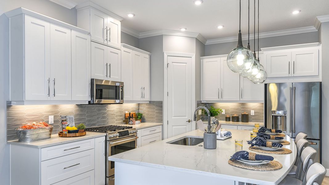 Furnished interior view inside a new home in Westview Community Group Page, Kissimmee (Image 8).