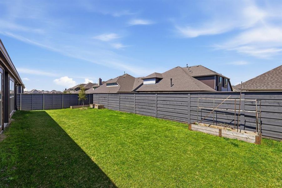 Exterior details and patio area of a home in Union Park, Little Elm (Image 27). Exterior details and patio area of a home in Union Park, Little Elm (Image 27).