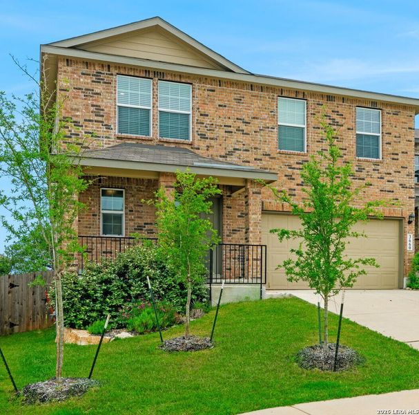 Front exterior of a new home in Copper Canyon, Bulverde, TX, highlighting curb appeal (Image 1). Front exterior of a new home in Copper Canyon, Bulverde, TX, highlighting curb appeal (Image 1).