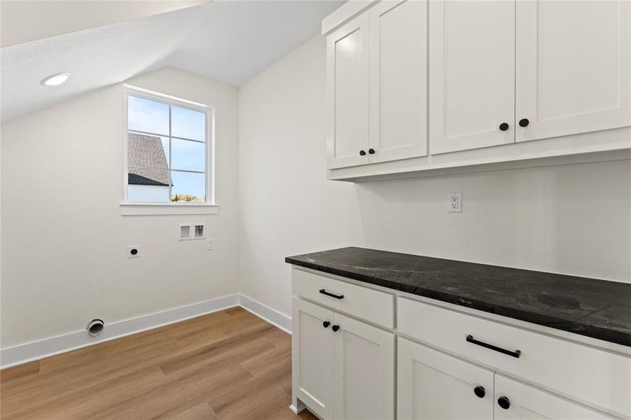 Furnished interior view inside a new home in , Woodway (Image 9).