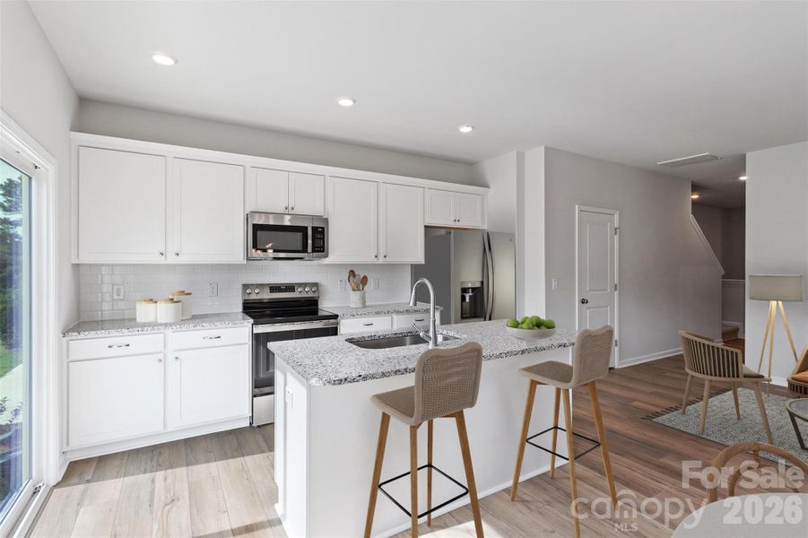 Furnished interior view inside a new home in Sloan Station, Charlotte (Image 6). Furnished interior view inside a new home in Sloan Station, Charlotte (Image 6).