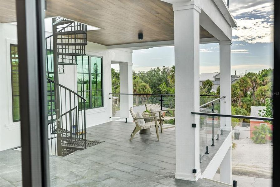 Exterior details and patio area of a home in , Sarasota (Image 38).