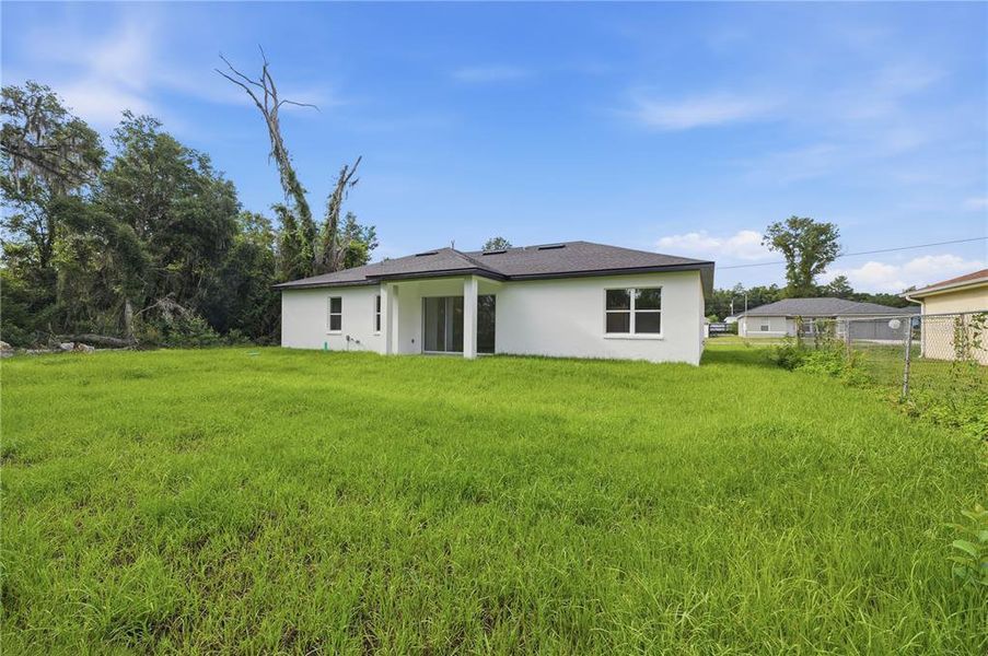 Exterior details and patio area of a home in , Ocala (Image 25).