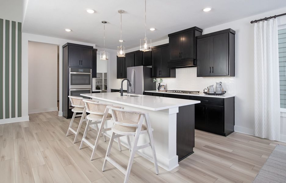 Representative furnished interior of a home built from the Victoria by Tri Pointe Homes in Painted Tree, McKinney (Image 16).