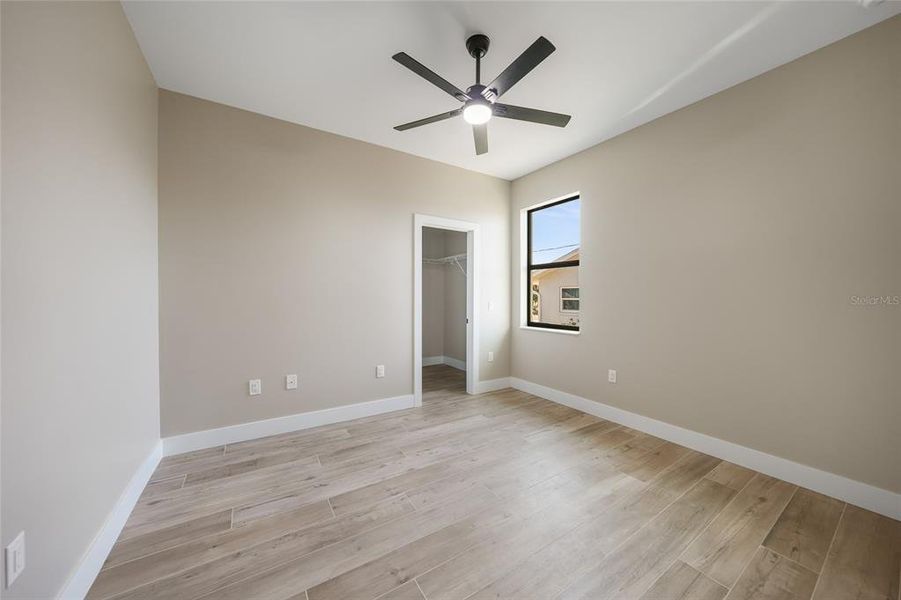 Spacious, unfurnished interior of a new home in , Port Charlotte (Image 15).