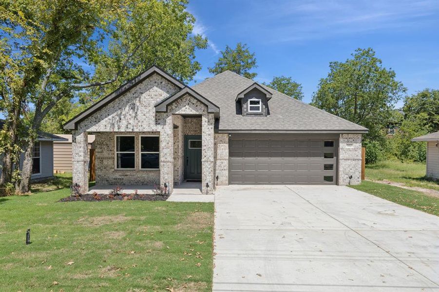 Front exterior of a new home in , Terrell, TX, highlighting curb appeal (Image 2).