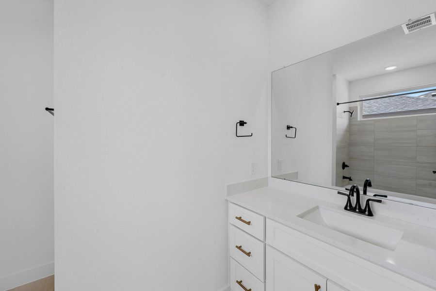 Furnished interior view inside a new home in Bridgeland, Cypress (Image 17).