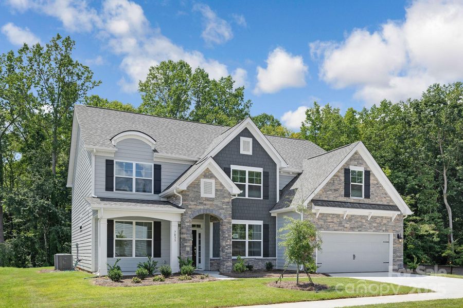 Front exterior of a new home in Sylvan Creek, Denver, NC, highlighting curb appeal (Image 26).