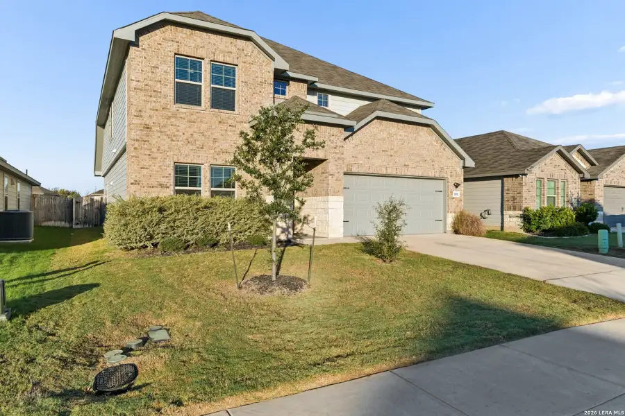 Front exterior of a new home in Autry Pond, San Antonio, TX, highlighting curb appeal (Image 26).