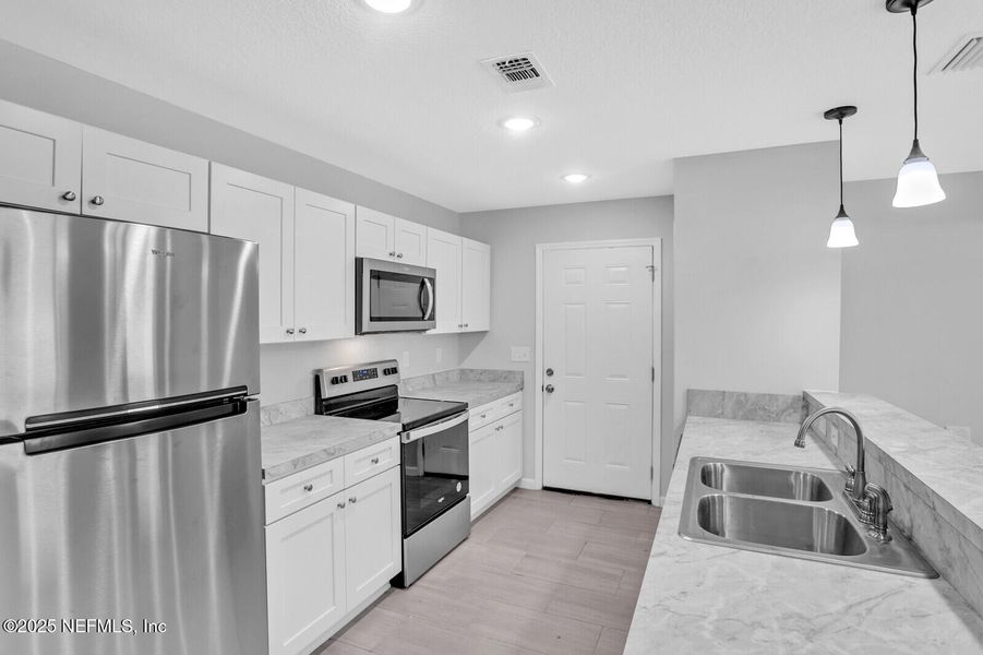 Furnished interior view inside a new home in , Jacksonville (Image 8).