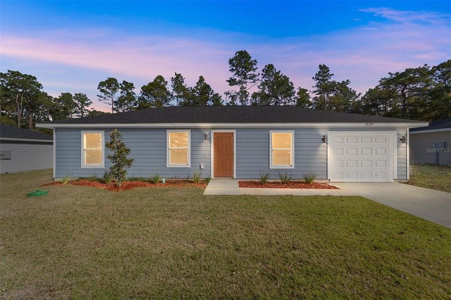 Front exterior of a new home in , Summerfield, FL, highlighting curb appeal (Image 1). Front exterior of a new home in , Summerfield, FL, highlighting curb appeal (Image 1).