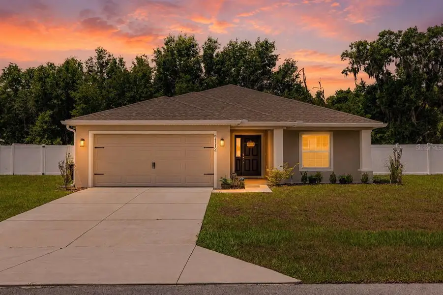 Front exterior of a new home in , Ocala, FL, highlighting curb appeal (Image 25). Front exterior of a new home in , Ocala, FL, highlighting curb appeal (Image 25).