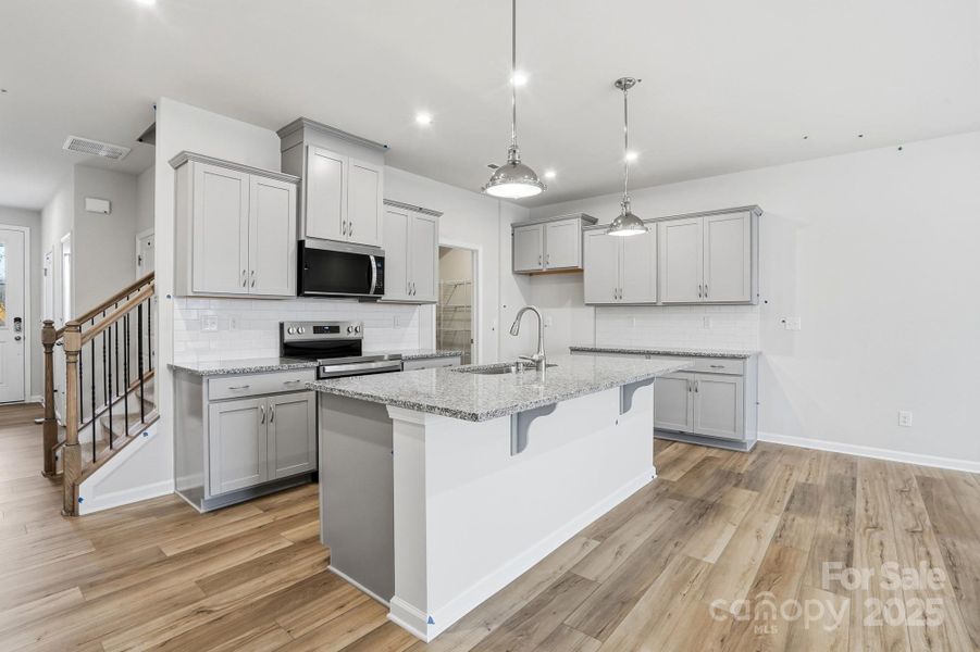 Furnished interior view inside a new home in , Charlotte (Image 4). Furnished interior view inside a new home in , Charlotte (Image 4).