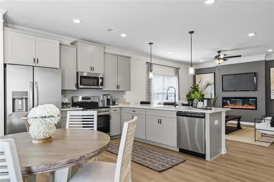 Furnished interior view inside a new home in Trinity Station, Auburn (Image 8).