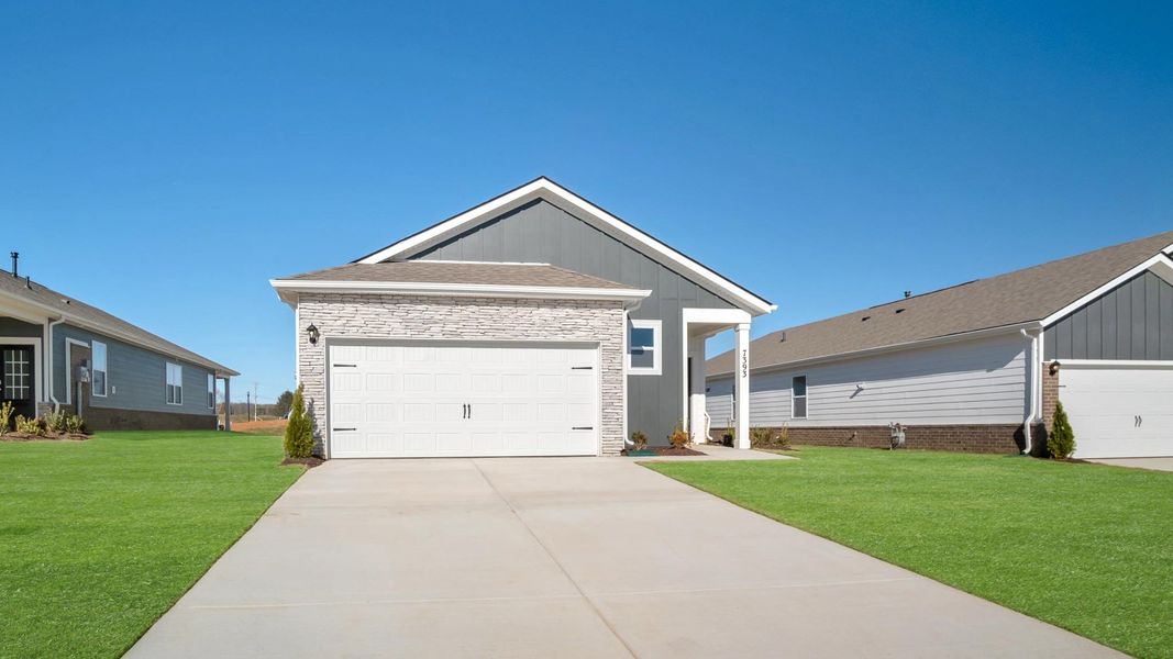 Front exterior of a new home in Legacy Farms, White House, TN, highlighting curb appeal (Image 20).
