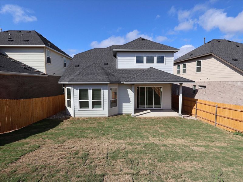 Exterior details and patio area of a home in Cedar Brook, Leander (Image 2). Exterior details and patio area of a home in Cedar Brook, Leander (Image 2).