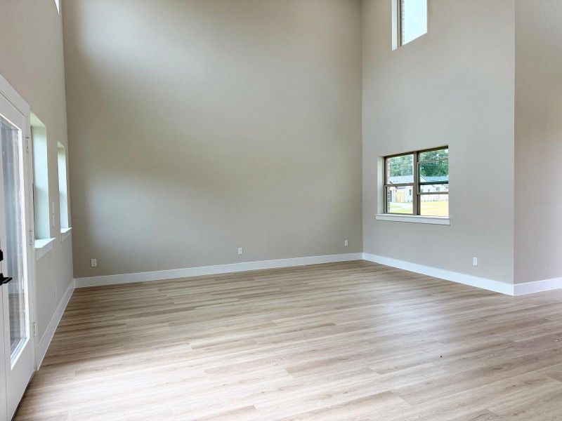 Experience the grandeur of soaring ceilings, enhancing space and elegance.