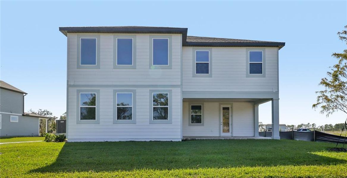 Exterior details and patio area of a home in Northlake Traditional, Winter Garden (Image 29).