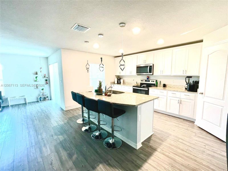 Furnished interior view inside a new home in , Port St. Lucie (Image 5). Furnished interior view inside a new home in , Port St. Lucie (Image 5).