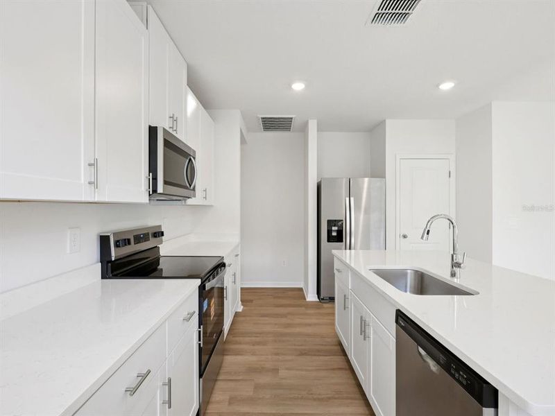 Furnished interior view inside a new home in Oakfield Trails - Premier Series, Parrish (Image 6).