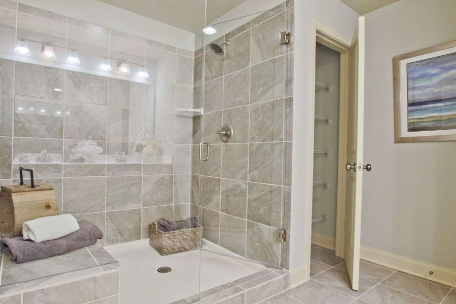 Representative furnished interior of a home built from the Barwick by KM Homes in Nickel Creek at Newnan Crossing, Newnan (Image 18).