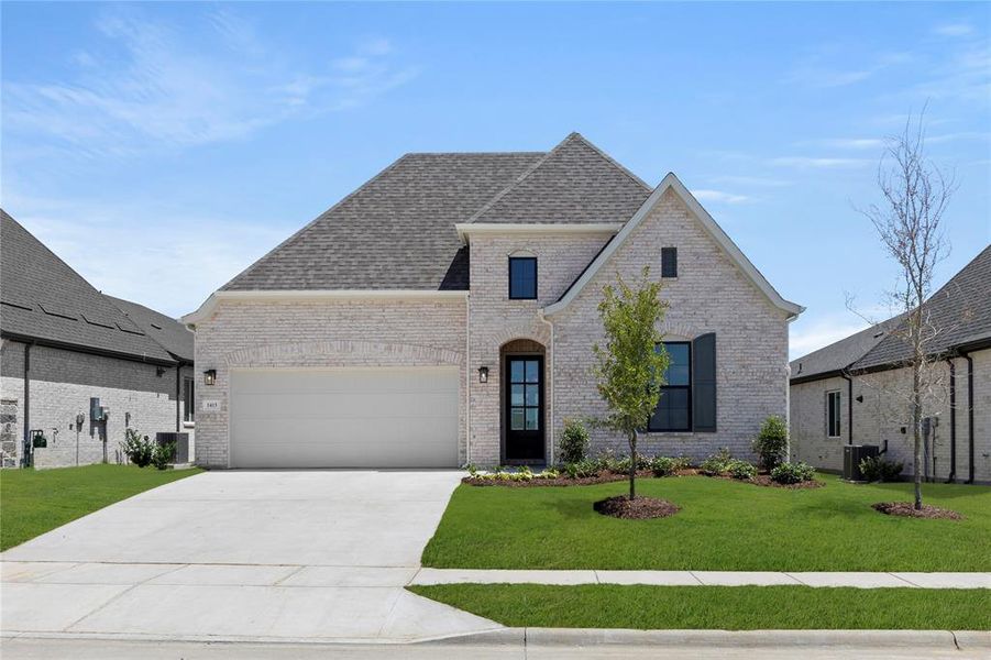 Front exterior of a new home in Devonshire, Heath, TX, highlighting curb appeal (Image 16).