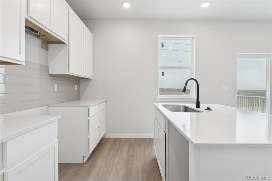 Furnished interior view inside a new home in Sweetgrass, Dacono (Image 4).
