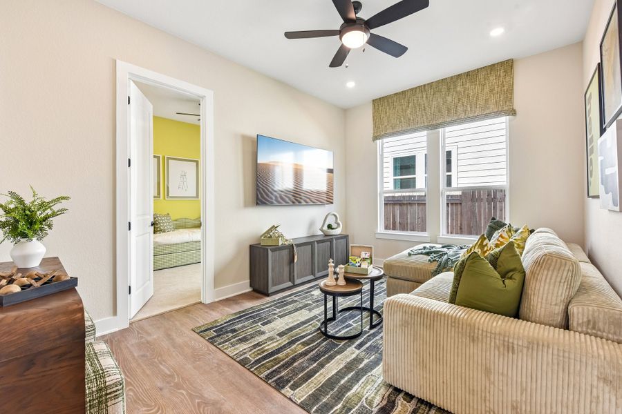 Representative furnished interior of a home built from the Enfield by Taylor Morrison in Village Grove, Dripping Springs (Image 10).