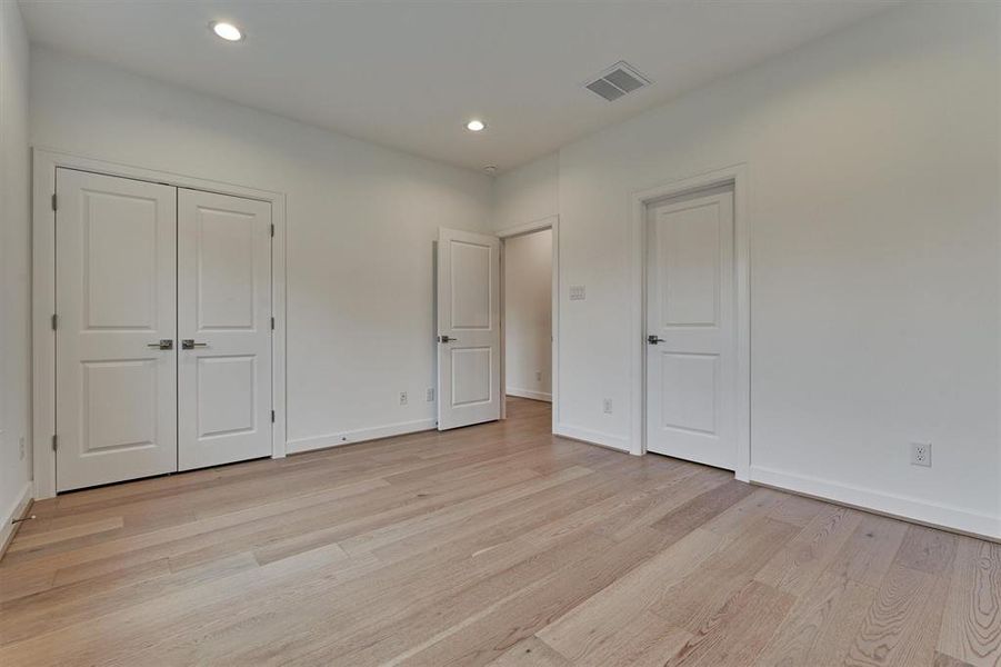 Secondary bedroom has generous closet with double doors!