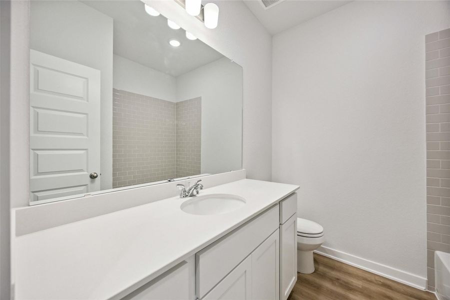 Furnished interior view inside a new home in Deer Pines, Conroe (Image 5).