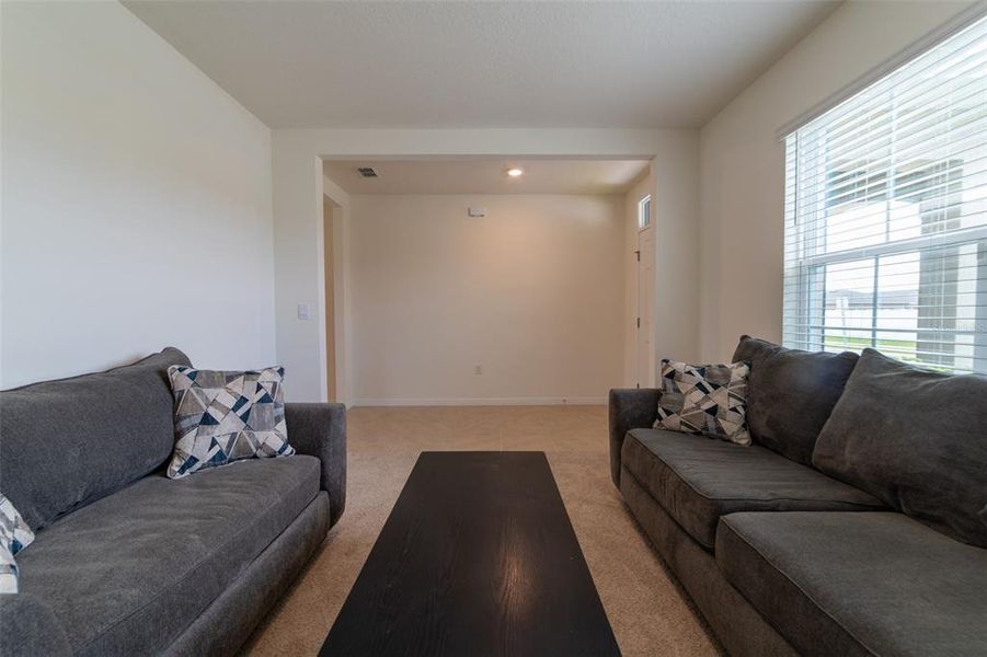 Furnished interior view inside a new home in , Harmony (Image 7).