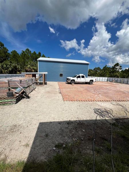 Front exterior of a new home in , Palm Bay, FL, highlighting curb appeal (Image 23).