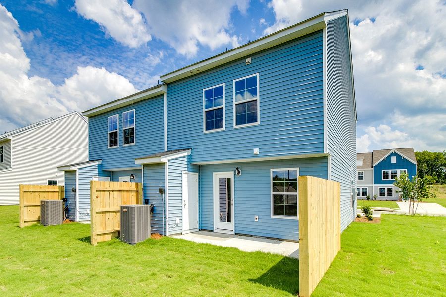 Exterior details and patio area of a home in Padgett Commons, Hopkins (Image 4).
