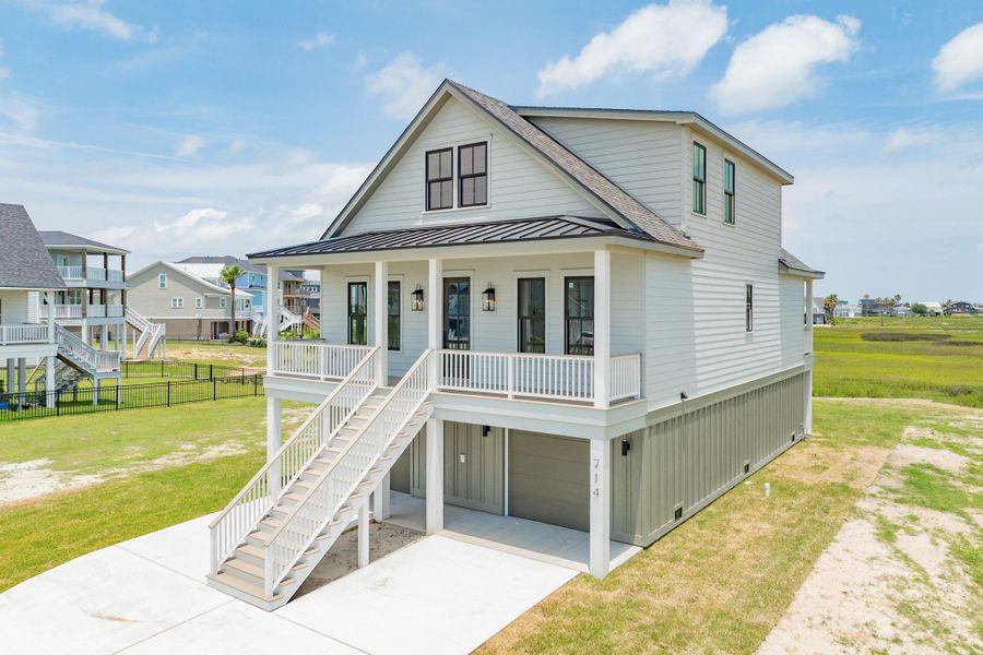 Front exterior of a new home in , Galveston, TX, highlighting curb appeal (Image 26).