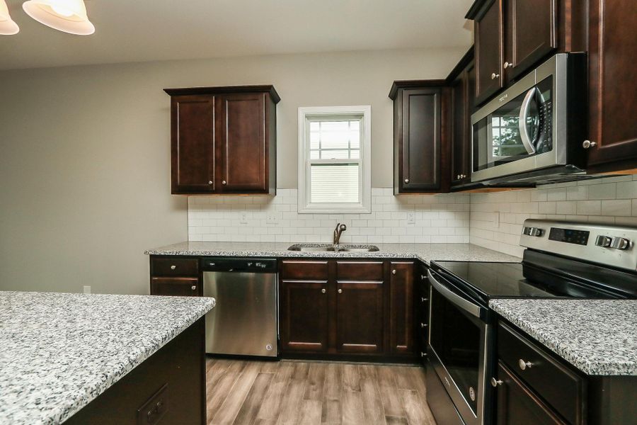 Representative furnished interior of a home built from the Palmer Plus by RiverWILD Homes in Riverwood Ranch, Clayton (Image 9).