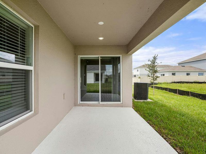 Your interior opens to outdoor living space on a covered lanai.