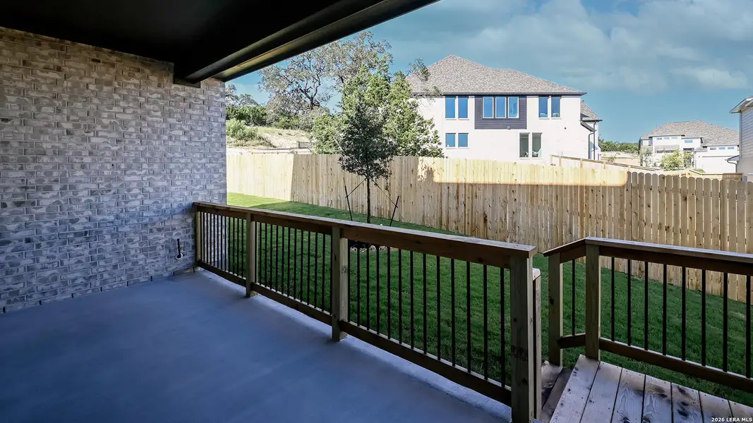 Exterior details and patio area of a home in Johnson Ranch, Bulverde (Image 3).