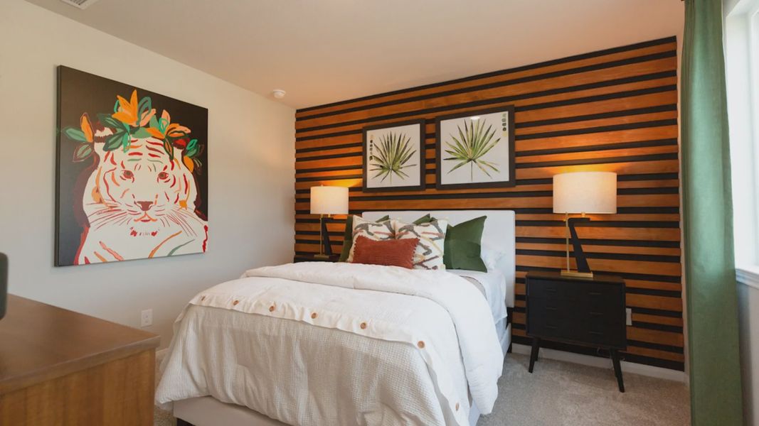 Representative furnished interior of a home built from the The Woodland by Legend Homes in Granger Pines, Conroe (Image 15).